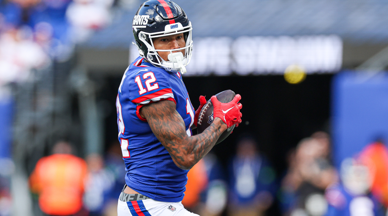 Oct 22, 2023; East Rutherford, New Jersey, USA; New York Giants tight end Darren Waller (12) catches the ball during the first half Washington Commanders at MetLife Stadium. Mandatory Credit: Vincent Carchietta-USA TODAY Sports  